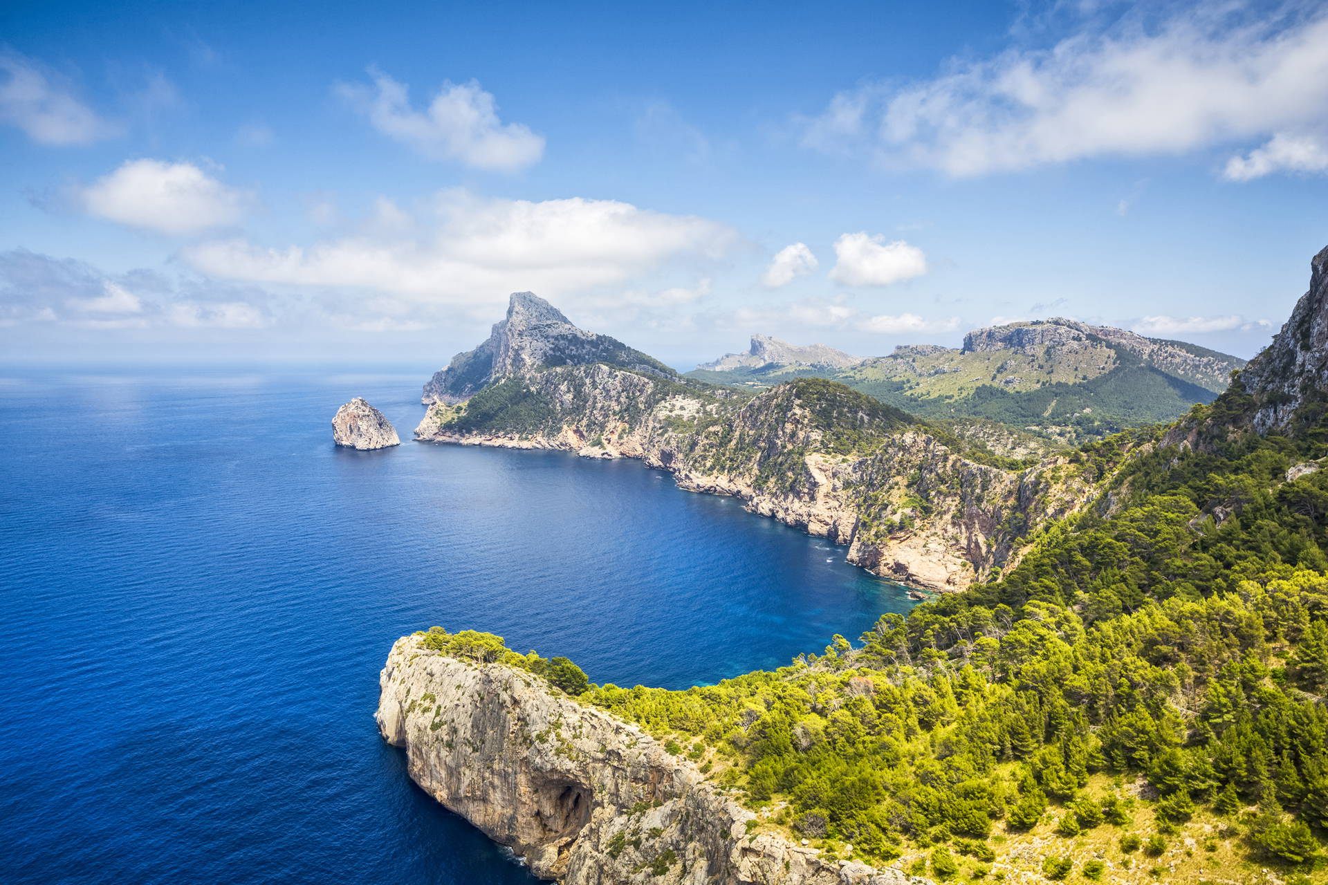 Rocky headlands and blue Mediterranean water in Mallorca.